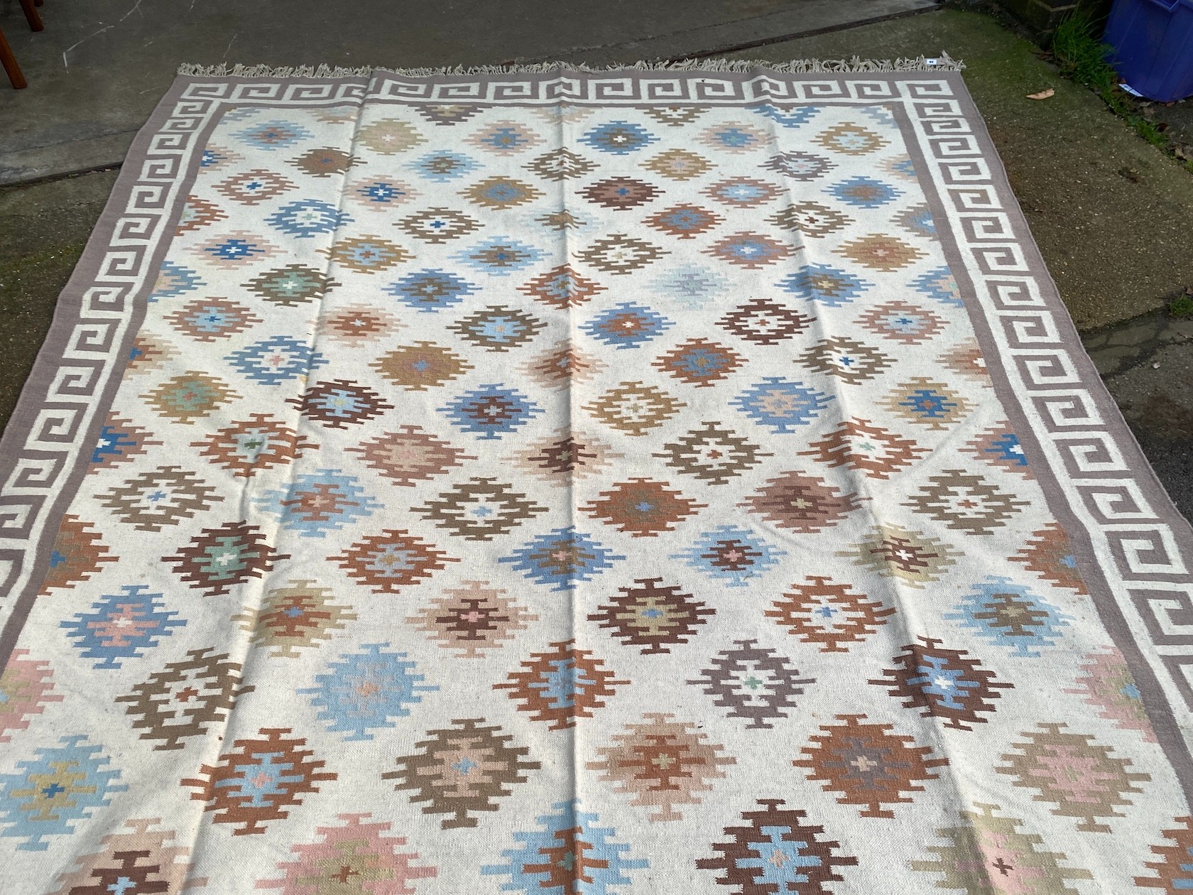 A Kilim Dhurrie polychrome flatweave carpet, approximately 360 x 280cm